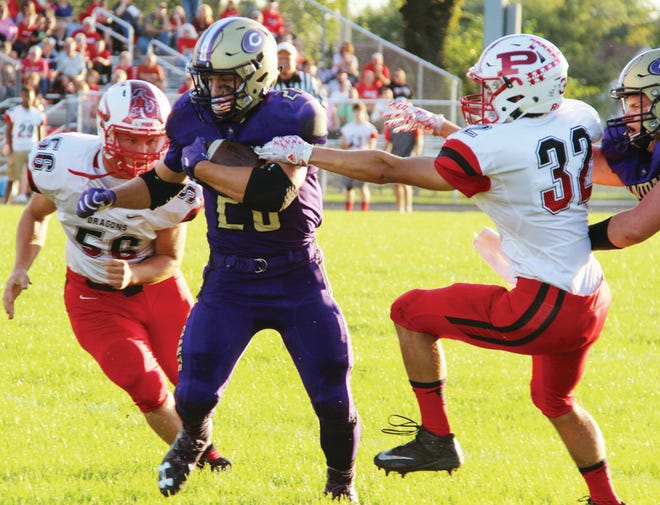 Canton running back Jace Chamberlin (with ball) and the Little Giants look to hang on to a least a share of the Mid-Illini Conference lead as they face Morton in their regular season home finale Friday at Ron Fahnestock Field. It will be Senior Night with the freshman game starting at 5 p.m. Senior Night activities will follow with the varsity game slated to begin at 7:30 p.m.