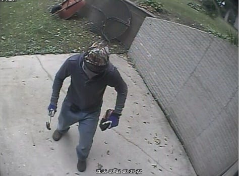 Surveillance photo of man suspected of robbing a home in the unincorporated village of Roby in Christian County.
