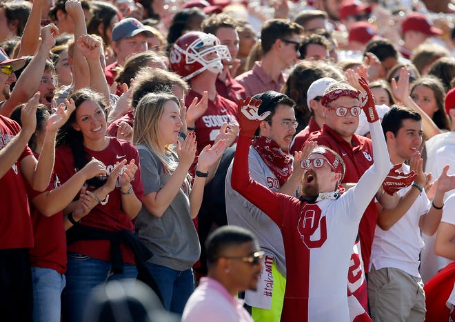 Oklahoma fans cheer during a college football game between the University of Oklahoma Sooners (OU) and the Kansas State Wildcats (KSU) at Gaylord Family-Oklahoma Memorial Stadium in Norman, Okla., Saturday, Oct. 15, 2016. Oklahoma won 38-17. Photo by Bryan Terry, The Oklahoman