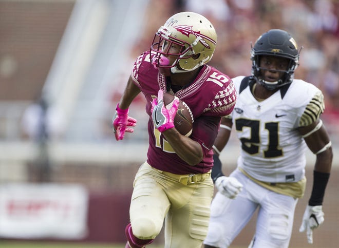 Florida State wide receiver Travis Rudolph turns upfield after a reception in the second half of a game against Wake Forest in Tallahassee on Saturday. (AP Photo/Mark Wallheiser)