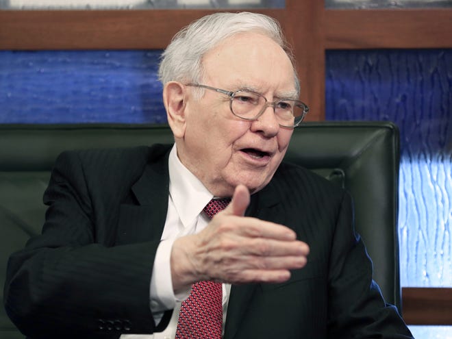 Berkshire Hathaway Chairman and CEO Warren Buffett is keeping a lot of cash on hand, just waiting for the next enticing deal. It's a high-class problem: cash is piling up at Berkshire Hathaway faster than he can invest it. FILE PHOTO/ASSOCIATED PRESS