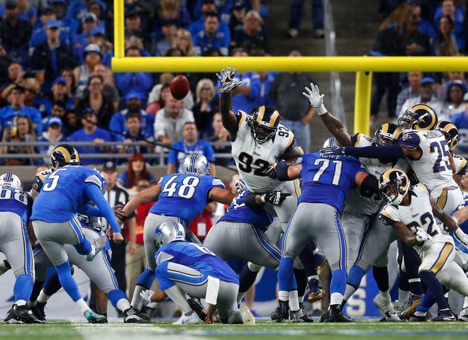 Detroit Lions kicker Matt Prater (5) kicks a game winning 34-yard field goal against the Los Angeles Rams in the fourth quarter of an NFL football game in Detroit, Sunday, Oct. 16, 2016. Detroit won 31-28.