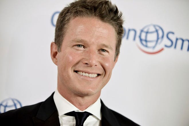 In this Sept. 19, 2014 file photo, Billy Bush arrives at the Operation Smile's 2014 Smile Gala in Beverly Hills, Calif.