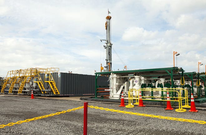 A natural gas well sits on a drilling site located at the Pittsburgh International Airport property in Findlay Township, Pa.