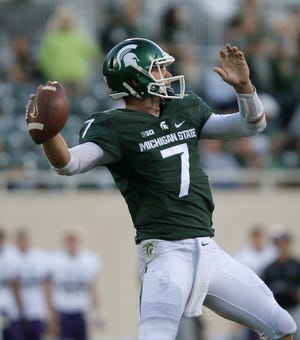 Michigan State quarterback Tyler O'Connor throws a pass against Northwestern during the fourth quarter of an NCAA college football game, Saturday, Oct. 15, 2016, in East Lansing, Mich. (AP Photo/Al Goldis)