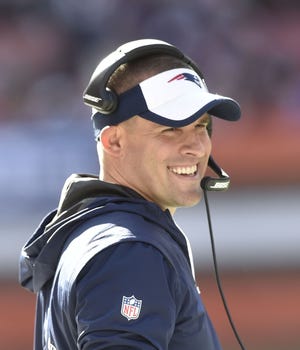 Patriots offensive coordinator Josh McDaniels has plenty to smile about these days with Tom Brady back at quarterback and explosive weapons such as Rob Gronkowski, Martellus Bennett, and Julian Edelman to utilize.
