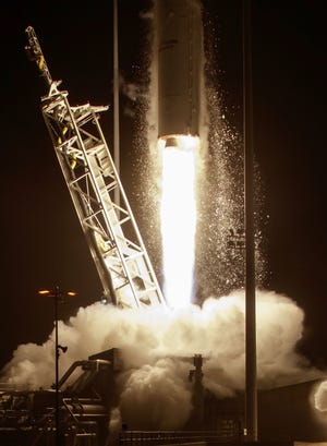 The Orbital ATK Antares rocket, with the Cygnus spacecraft onboard, launches Monday, Oct. 17, 2016 at NASA's Wallops Flight Facility in Wallops Island, Va. Orbital ATK's sixth contracted cargo resupply mission with NASA to the International Space Station is delivering over 5,100 pounds of science and research, crew supplies and vehicle hardware to the orbital laboratory and its crew. Bill Ingalls/NASA via AP