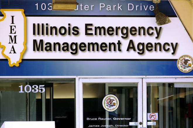 In this Friday, Oct. 14, 2016 photo, an Illinois Department of Emergency Management sign is above the entrance to their office in Springfield. (AP Photo/Seth Perlman)