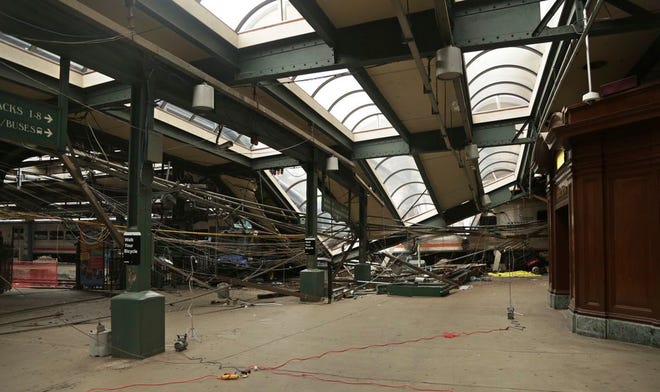 This Oct. 1 file photo provided by the National Transportation Safety Board shows damage done to the Hoboken Terminal in Hoboken, N.J., after a commuter train crash that killed one person and injured more than 100 others. New Jersey legislators will consider granting themselves subpoena power as they begin to look into last month's New Jersey Transit train crash.