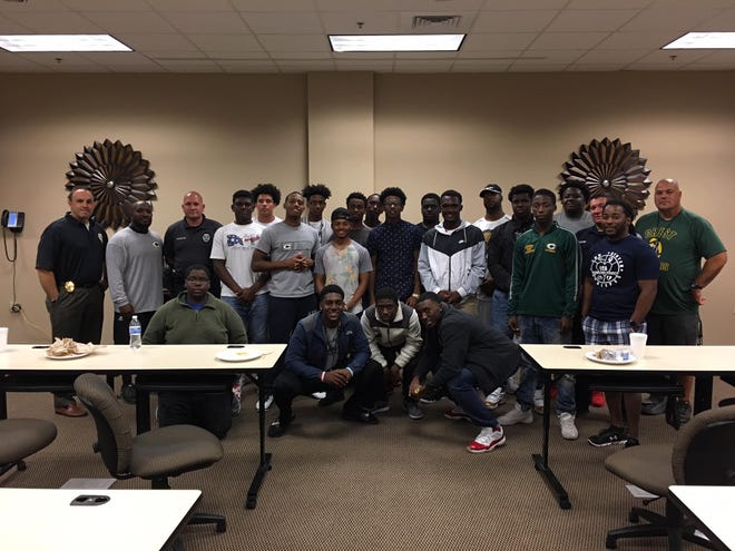 Members of the Crest and Shelby high school football teams met Tuesday with Shelby Police Chief Jeff Ledford and other department members to voice their feelings and concerns about about how to bridge the gap between the black community and law enforcement. Special to The Star