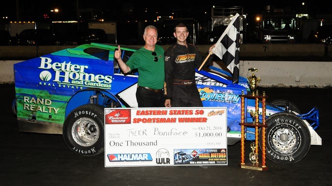 Tyler Boniface, right, celebrates winning the 50-lap championship for the Sportsman division in the 55th annual Eastern States Weekend Racing Festival on Friday night at Orange County Fair Speedway in Middletown. Bob Armbruster/ Photo provided.