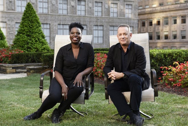 SNL cast member Leslie Jones poses with Tom Hanks, who guest-hosts the show on NBC at 11:30 p.m. NBC PHOTO