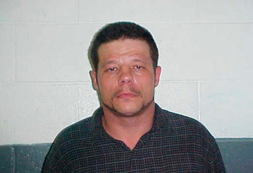 This June 8, 2010 photo provided by the Kay County Detention Center shows Michael Vance. Authorities are searching for Vance, who is suspected in a double slaying and accused of shooting and wounding multiple police officers near Oklahoma City on Sunday, Oct. 23, 2016. (Kay County Detention Center via AP)