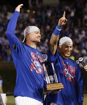 Jon Lester (left), who was co-MVP of the National League Championship Series with Javier Baez (right), is one of five members of the 2013 Red Sox who are playing in this year's World Series.