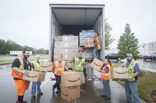 In total, Amazon shipped more than $500,000 worth of supplies to support those affected by Hurricane Matthew. Pictured are associates from Amazon’s Spartanburg, S.C., fulfillment center. Employees at the local fulfillment center in Chester, amassed 30 pallets of food, water and other essentials, which totaled more than $40,000 worth of supplies. Contributed Photo