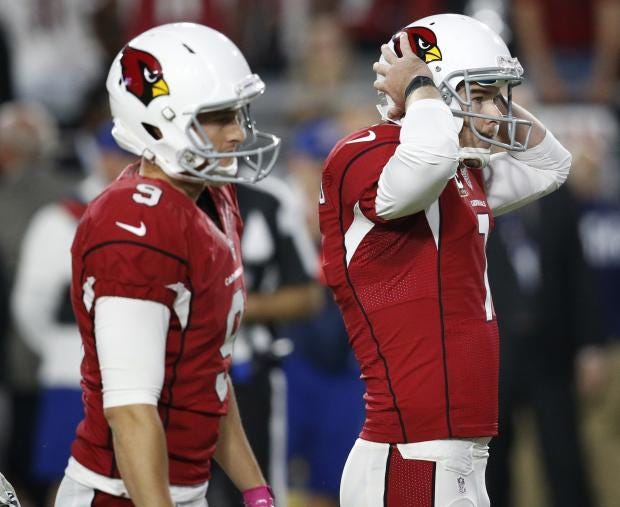 Arizona kicker Chandler Catanzaro reacts to a missing an overtime field goal that would have given the Cardinals a victory over Seattle on Sunday night. (AP Photo)