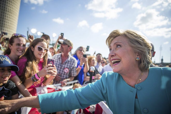Democratic presidential nominee Hillary Clinton greets supporters following a rally at Curtis Hixon Waterfront Park on Wednesday in downtown Tampa. (Loren Elliot/Tampa Bay Times via AP)