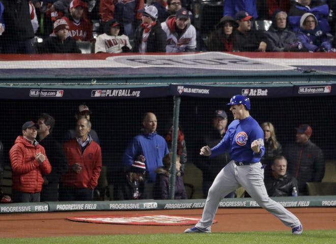 Chicago Cubs' Anthony Rizzo celebrates after scoring on a hit by Ben Zobrist during the fifth inning of Game 2 of the Major League Baseball World Series against the Cleveland Indians Wednesday, Oct. 26, 2016, in Cleveland. THE ASSOCIATED PRESS / CHARLIE RIEDEL