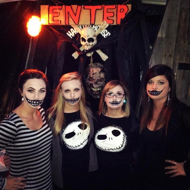 Volunteers pose at the Candlewick Haunted House in 2015. CONTRIBUTED PHOTO