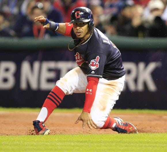 Francisco Lindor puts on the brakes and is able to get back to first base. (Bob Rossiter The Repository)