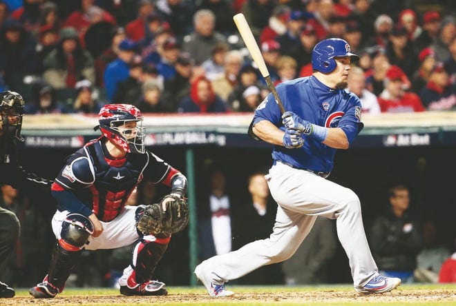 The Chicago Cubs' Kyle Schwarber hits an RBI single in the third inning against the Cleveland Indians during Game 2 of the World Series on Wednesday, at Progressive Field in Cleveland. The Cubs won, 5-1, to even the series. Brian Cassella/Chicago Tribune/TNS