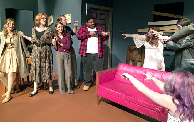 Cast members rehearse a scene from Laugh/Riot Performing Arts Company's "Night of the Living Dead." CONTRIBUTED PHOTO