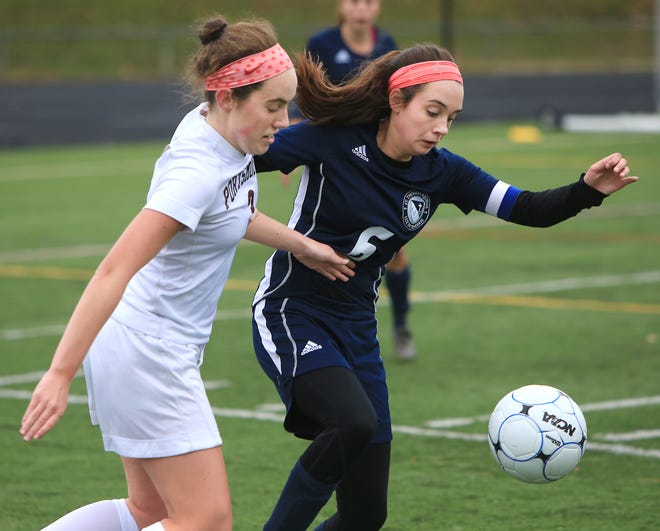 Portsmouth High School's Ginger Prevost, left, and St. Thomas Aquinas' Jessie Blaisdell compete for the ball during Thursday's Division II girls soccer playoff game at Tom Daubney Field. The Clippers advanced with their third 1-0 win over St. Thomas this season.
Photo by Ioanna Raptis/Seacoastonline