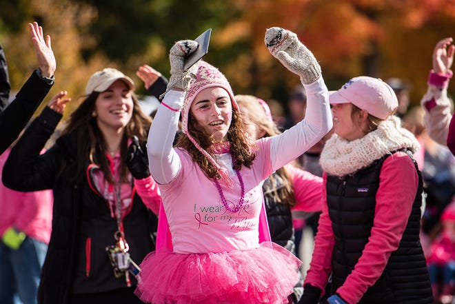 Stephanie Reed, of Hampton, warms up before the Making Strides Against Breast Cancer walk in Exeter. Her mother is in recovery from breast cancer. Anna Solo photo