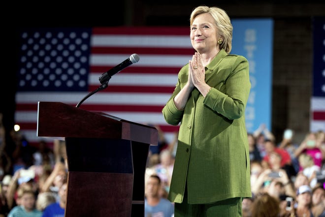 Democratic presidential candidate Hillary Clinton reacts to applause as she speaks at a rally in Tampa in July. She will campaign in Daytona Beach on Saturday at 4:15 p.m. ASSOCIATED PRESS FILE/ANDREW HARNIK