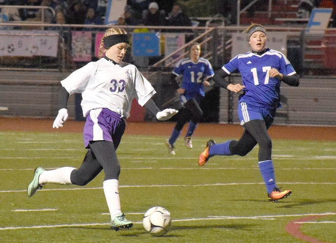 Kailee Jasewicz makes a second-half run up the field for Little Falls Wednesday with Emma Bilinski (17) in pursuit for Dolgeville.  

Times Telegram Photo/Jon Rathbun