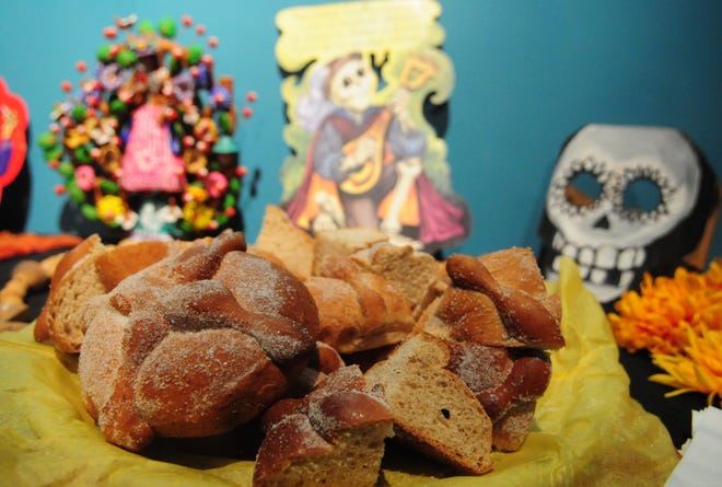 Pan de Muerto is offered at a Dia de los Muertos event at the Holland Area Arts Council in 2010. This year, the arts council is hosting a short film "fiesta" Thursday. Sentinel file