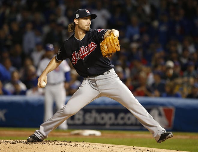 Cleveland Indians starting pitcher Josh Tomlin (43) throws during the first inning of Game 3 of the Major League Baseball World Series against the Chicago Cubs, Friday, Oct. 28, 2016, in Chicago. (AP Photo/Nam Y. Huh)