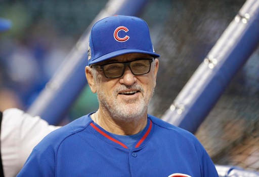 Chicago Cubs manager Joe Maddon smiles before Game 4 of the Major League Baseball World Series against the Cleveland Indians Saturday, Oct. 29, 2016, in Chicago. (AP Photo/David J. Phillip)