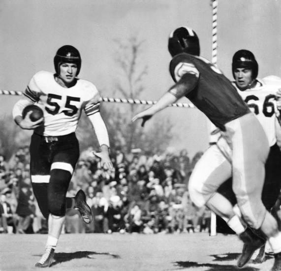 Oklahoma A&M star Bob Fenimore runs alongside teammate Jim Reynolds in the 1945 Bedlam game. (Oklahoman archive photo)
