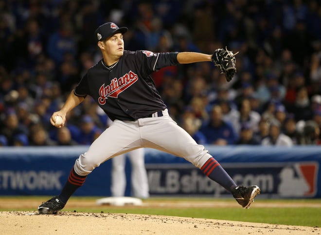 Cleveland Indians starting pitcher Trevor Bauer throws during the first inning of Game 5 of the Major League Baseball World Series against the Chicago Cubs, Sunday, Oct. 30, 2016, in Chicago. (AP Photo/Nam Y. Huh)