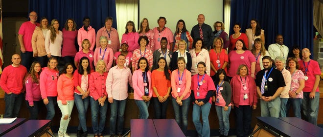 Above, the Cooke school's faculty and staff helped support National Denim Day. PHOTO PROVIDED