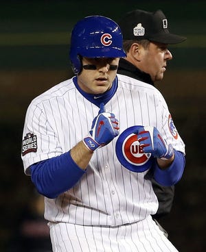 Cubs first baseman Anthony Rizzo reacts after hitting a double during the fourth inning of Chicago's 3-2 win over the Indians on Sunday night in Game 5 of the World Series at Wrigley Field. Cleveland leads the series 3-2 with Game 6 on Tuesday night at Progressive Field in Cleveland.