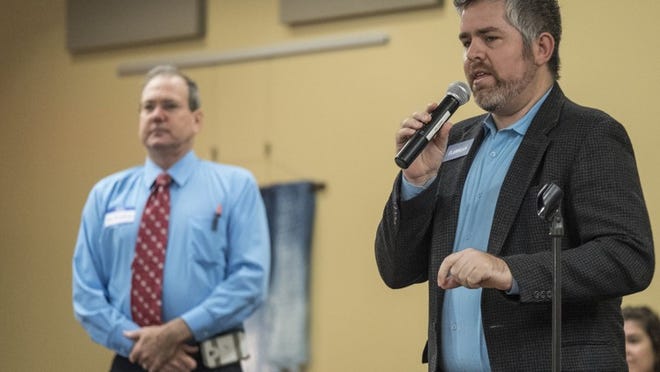 Austin City Council District 6 candidate Jimmy Flannigan, right, answers questions during an Oct. 1 forum with City Council Member Don Zimmerman, left.
