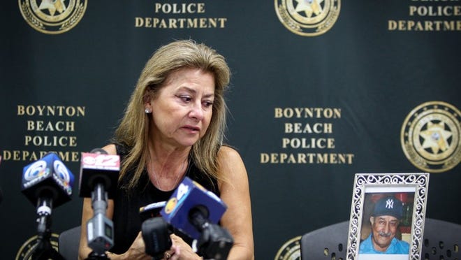 Soheila Marchal talks about her father Ali Arezoumandifar, shot and killed at his Liquor Market last year, at Boynton Beach police deparment headquarters on November 1, 2016. (Richard Graulich / The Palm Beach Post)