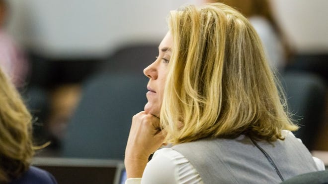 Former Assistant State Attorney Angela Miller listens to the testimony of Palm Beach County State Attorney Dave Aronberg on Friday.