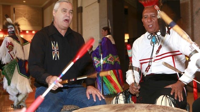 Robert Bass, left, and Lenny Medina play the drum during the fourth annual American Indian Heritage Day at the Bullock Texas State History Museum in September. The museum will be celebrating American Indian Heritage Month at Free First Sunday. Stephen Spillman for American-Statesman