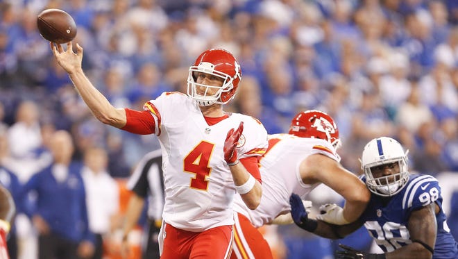 Kansas City Chiefs quarterback Nick Foles (4) throws a touchdown pass during the first half against the Indianapolis Colts on Sunday at Lucas Oil Stadium in Indianapolis. The Chiefs won the game 30-14. (Sam Riche/TNS)