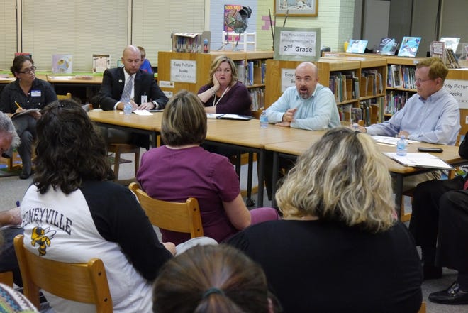 School board members met with parents and staff at Edneyville Elementary on Tuesday evening to discuss concerns about the fate of the building.