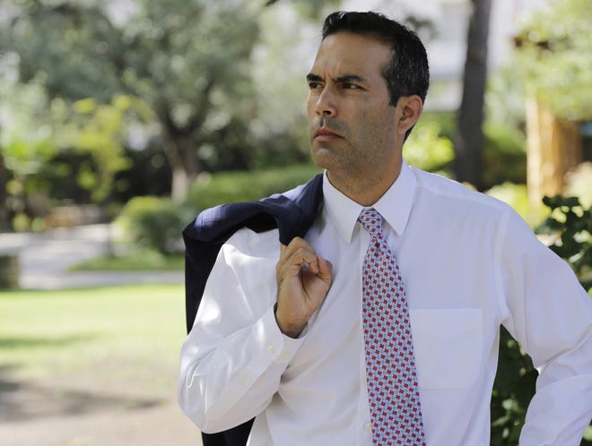 Texas Land Commissioner George P. Bush tours the grounds of the Alamo. (AP Photo/Eric Gay, File)