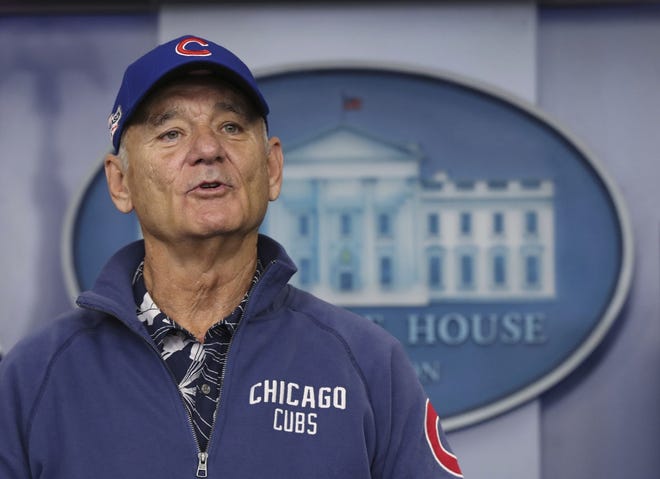 Bill Murray gave a ticketless fellow Cubs fan an extra seat to Game 6 of the World Series. The Associated Press