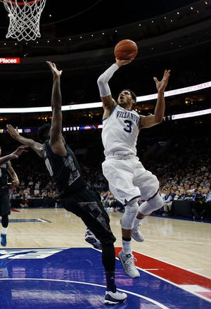 FILE - In this March 5, 2016, file photo, Villanova's Josh Hart shoots during an NCAA college basketball game against Georgetown, in Philadelphia. Hart, the Big East's preseason player of the year, was selected to The Associated Press' preseason All-America college basketball team, Wednesday, Nov. 2, 2016. (AP Photo/Matt Slocum, File)
