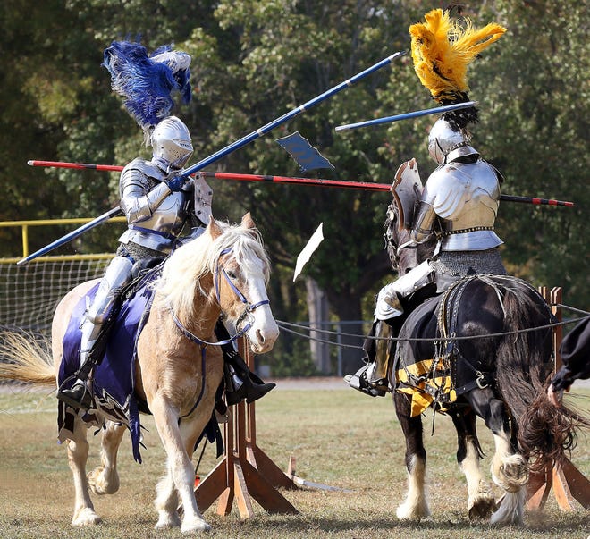 Sir Jackson, left, and Sir Matthew from Early Act First Knight in Kannapolis, compete in a jousting exhibition at Grier Middle School on Wednesday afternoon. JOHN CLARK/THE GAZETTE