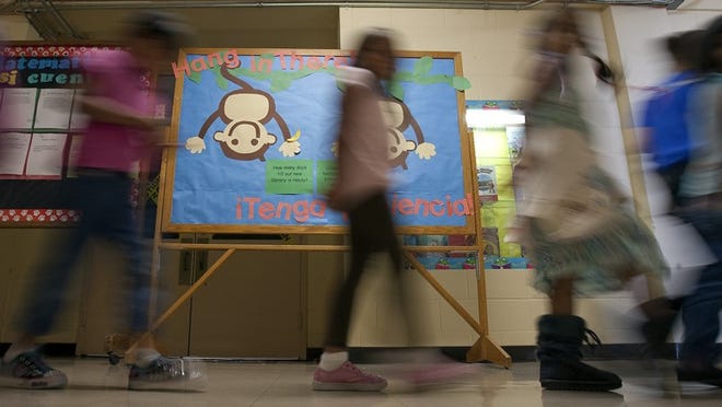 Students walk past the T.A. Brown Elementary School library after lunch on Oct. 13, 2011. School officials cancelled classes Friday over safety concerns regarding the floors’ structural capacity. Photo: Rodolfo Gonzalez / AMERICAN-STATESMAN