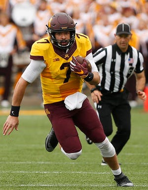 FILE - In this Sept. 24, 2016, file photo, Minnesota quarterback Mitch Leidner (7) runs with ball during an NCAA college football game against Colorado State, in Minneapolis. Minnesota hosts Purdue on Saturday. (AP Photo/Stacy Bengs, FIle)