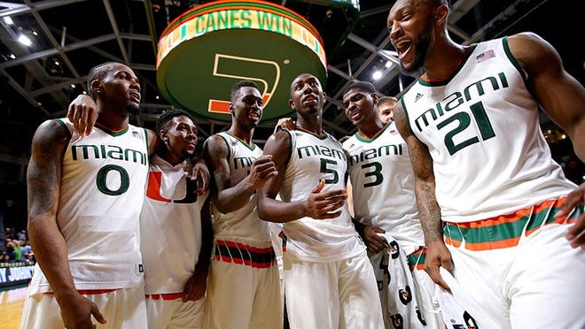 MIAMI, FL - FEBRUARY 22: Miami Hurricanes players celebrate after the game against the Virginia Cavaliers at the BankUnited Center on February 22, 2016 in Miami, Florida. (Photo by Rob Foldy/Getty Images)